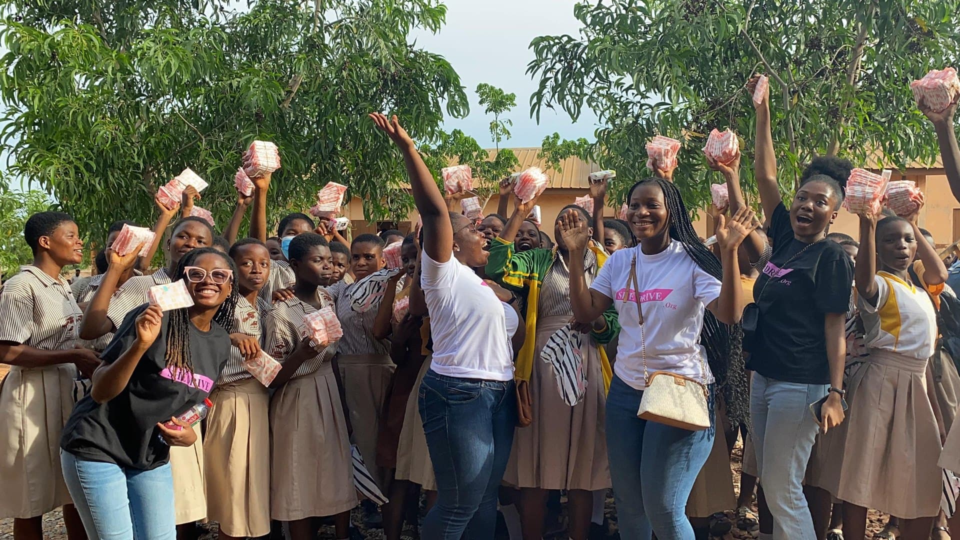 Children celebrating with supplies